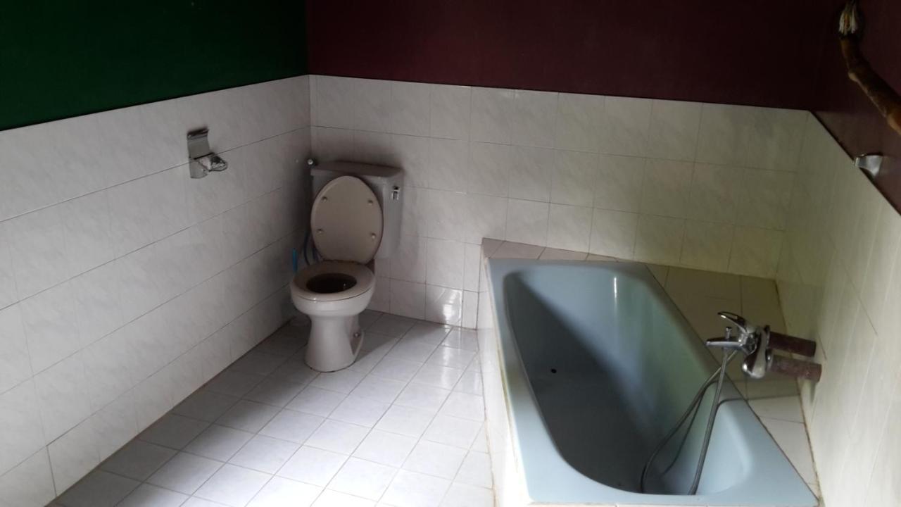 Liberta Homestay ตุกตุก ภายนอก รูปภาพ