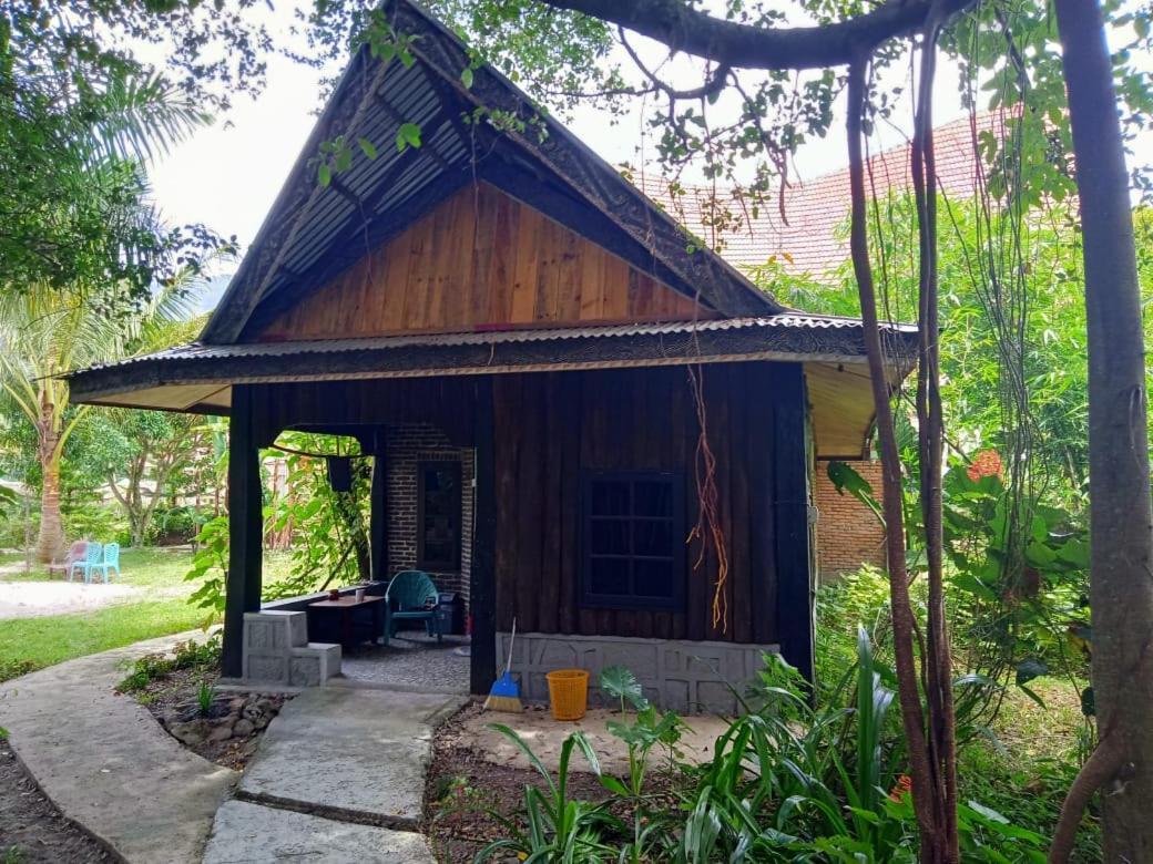 Liberta Homestay ตุกตุก ภายนอก รูปภาพ