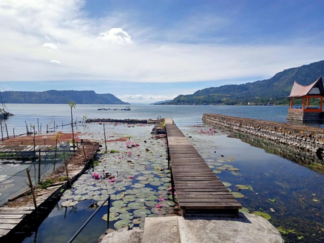 Liberta Homestay ตุกตุก ภายนอก รูปภาพ